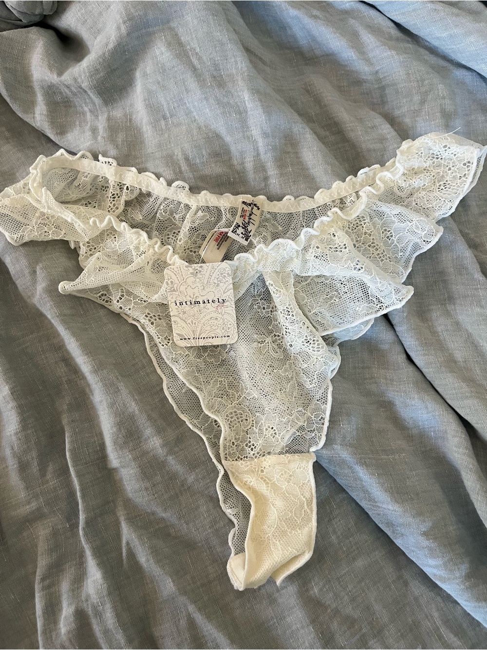 Free People Ruffled Lace Thong Panty in Ivory